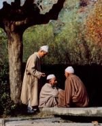 Photo of A group of Kashmiri men wearing the Pheran from Kashmir Valley